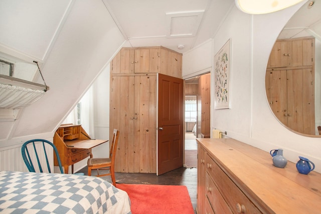 bedroom with dark wood-style floors