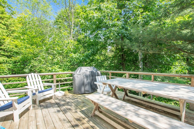 wooden deck with grilling area