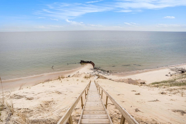 view of water feature with a beach view