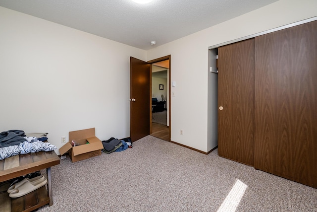 unfurnished bedroom with carpet floors