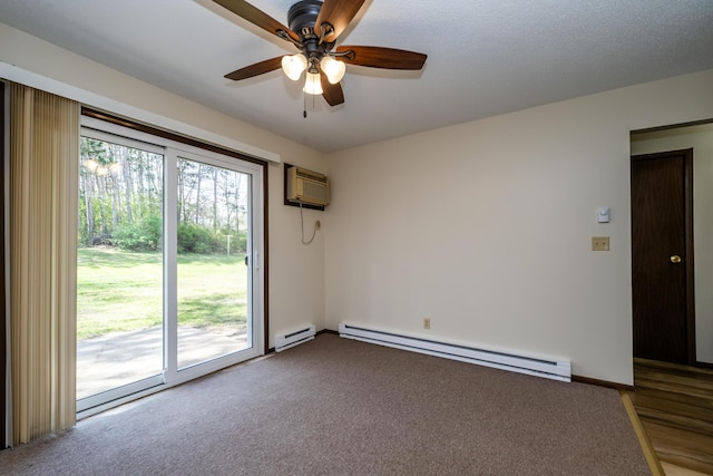 carpeted spare room featuring ceiling fan, baseboard heating, and an AC wall unit