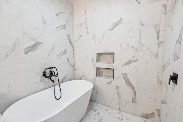 full bath with a freestanding bath