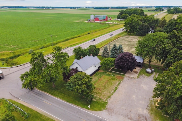 birds eye view of property featuring a rural view