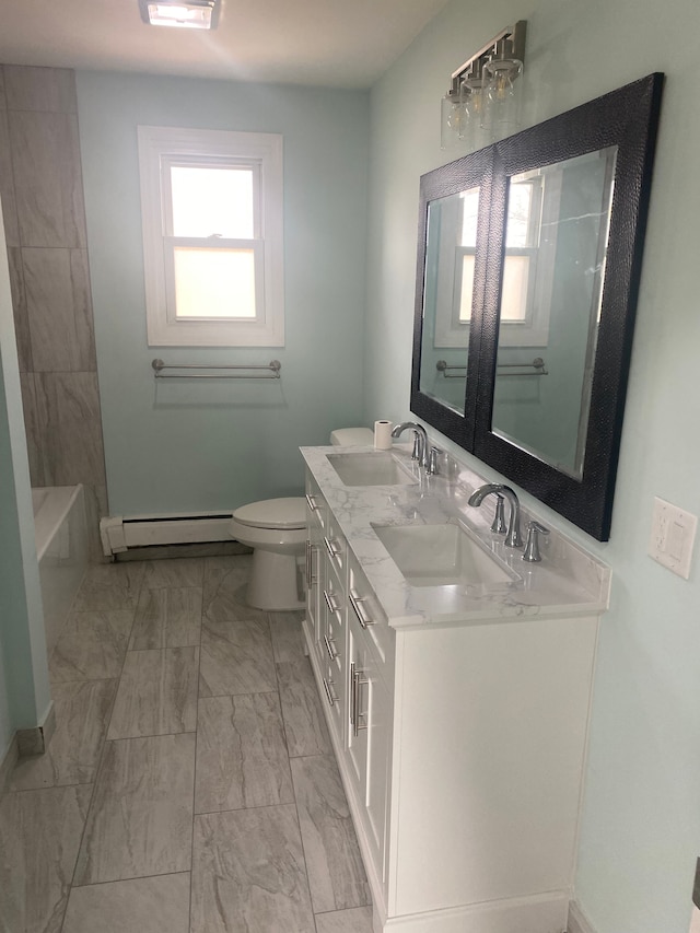 32198 Truman Rd, Rockwood, MI 48173 - full bath featuring a sink, marble finish floor, a baseboard heating unit, and toilet