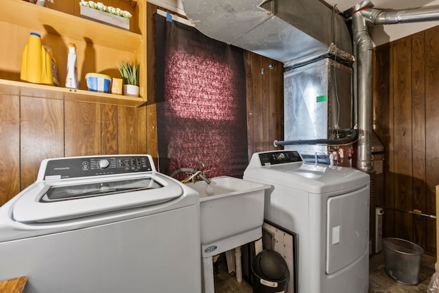 25884 Leach St, Roseville, MI 48066 - washroom with washer / dryer, laundry area, wood walls, and a sink