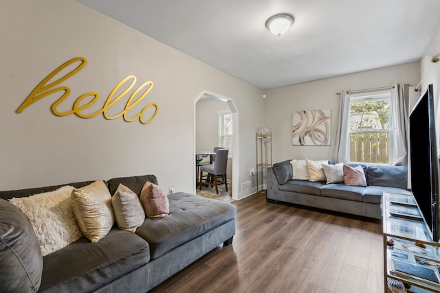 25884 Leach St, Roseville, MI 48066 - living area with arched walkways and wood finished floors