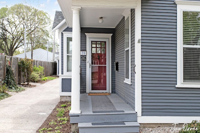 property entrance featuring fence