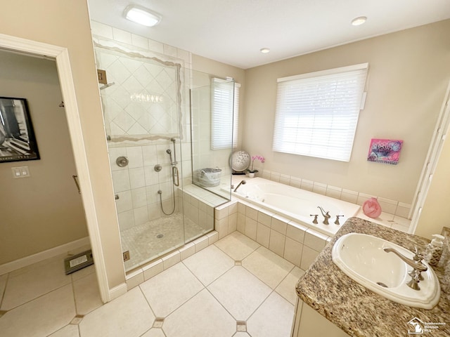 full bath featuring tile patterned flooring, a shower stall, a sink, and a bath