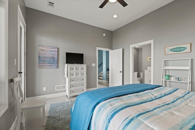bedroom with baseboards, ensuite bathroom, a ceiling fan, and visible vents