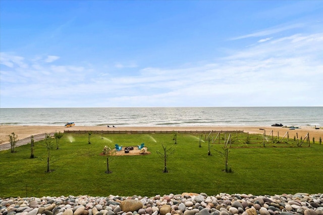 water view with a beach view and fence