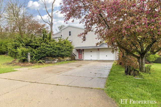view of front of house featuring a garage and driveway