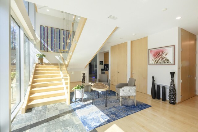 interior space featuring recessed lighting and wood finished floors