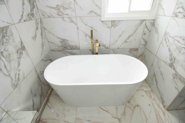 17150 Santa Barbara Dr, Detroit, MI 48221 - full bath with marble tiled floors, a soaking tub, and tile walls