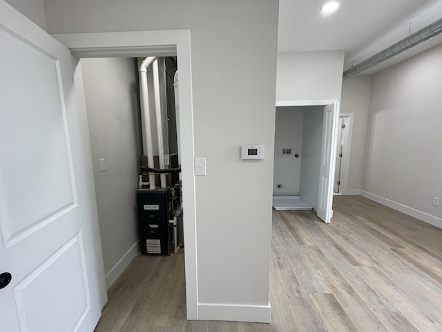 171 Davis St, Wyandotte, MI 48192 - hallway featuring light wood-type flooring, baseboards, and recessed lighting
