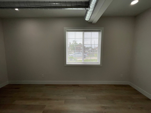 171 Davis St, Wyandotte, MI 48192 - spare room featuring baseboards and light wood-style flooring