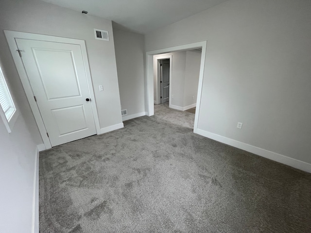 171 Davis St, Wyandotte, MI 48192 - unfurnished bedroom with carpet flooring and baseboards