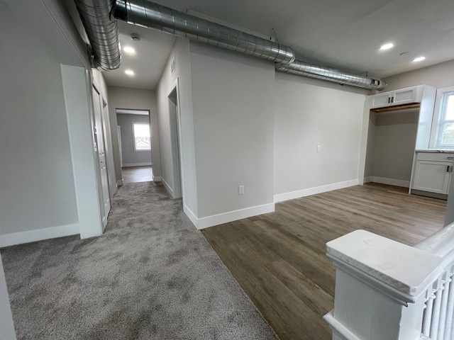 171 Davis St, Wyandotte, MI 48192 - basement featuring plenty of natural light, baseboards, dark wood-style flooring, and recessed lighting