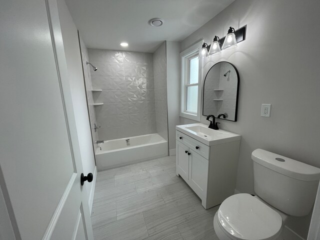 171 Davis St, Wyandotte, MI 48192 - full bath with toilet, vanity, shower / washtub combination, and recessed lighting