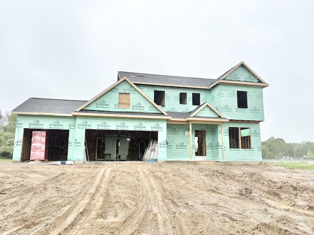 8345 Kettle Oak Dr SE, Alto, MI 49302 - property under construction featuring dirt driveway and a garage