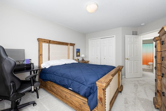 bedroom with light carpet, a closet, and visible vents