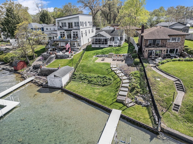 23848 Brady St, Edwardsburg, MI 49112 - view of home's community featuring a residential view, stairs, a deck with water view, and a dock