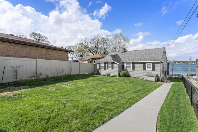 23848 Brady St, Edwardsburg, MI 49112 - exterior space featuring a fenced backyard and a water view