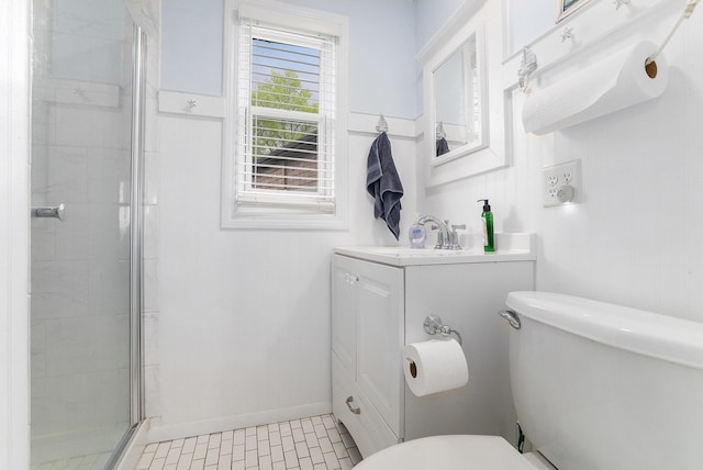 23848 Brady St, Edwardsburg, MI 49112 - full bathroom featuring vanity, baseboards, a stall shower, and toilet
