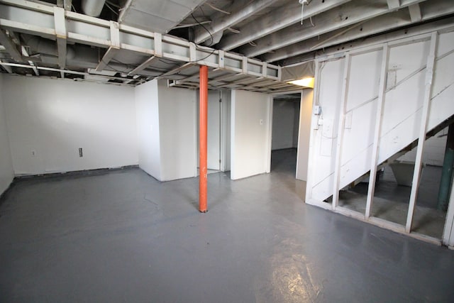 basement featuring stairway