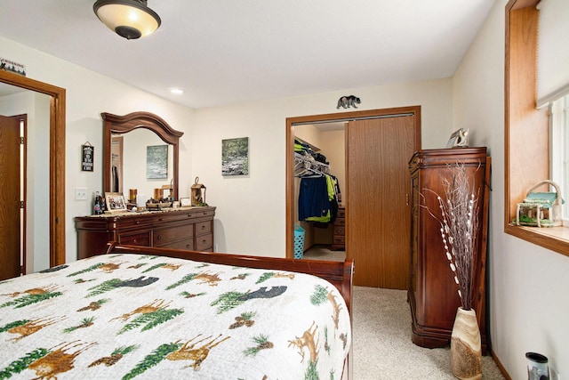 carpeted bedroom featuring a closet