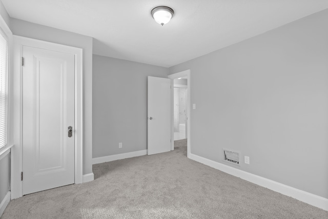 17193 Pierson St, Detroit, MI 48219 - unfurnished bedroom with baseboards, carpet flooring, and visible vents