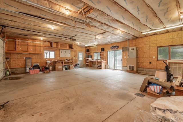 garage with visible vents and a garage door opener