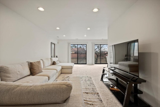 living room featuring carpet floors and recessed lighting