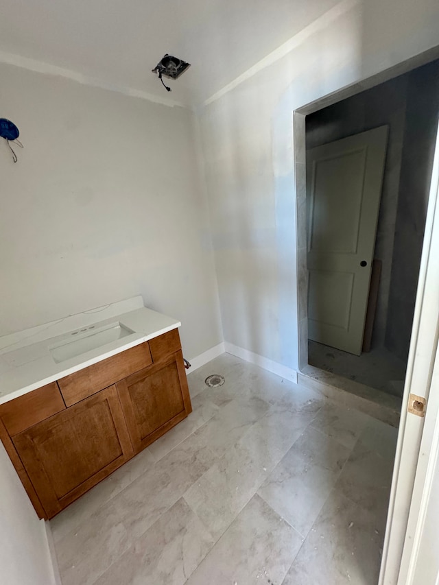 bathroom featuring baseboards