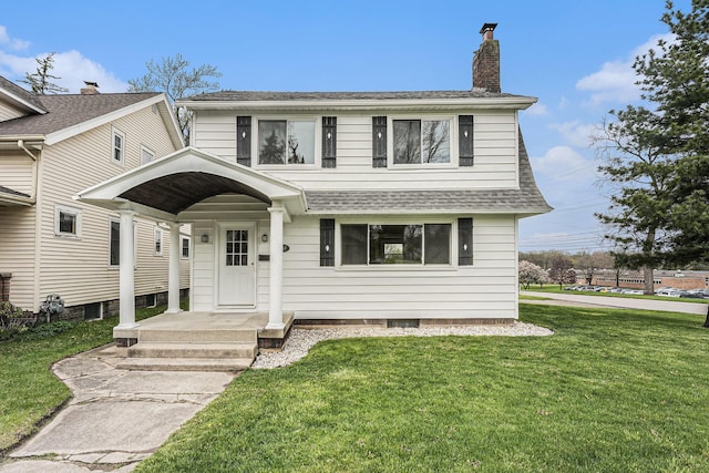 traditional home with a shingled roof, a chimney, and a front lawn