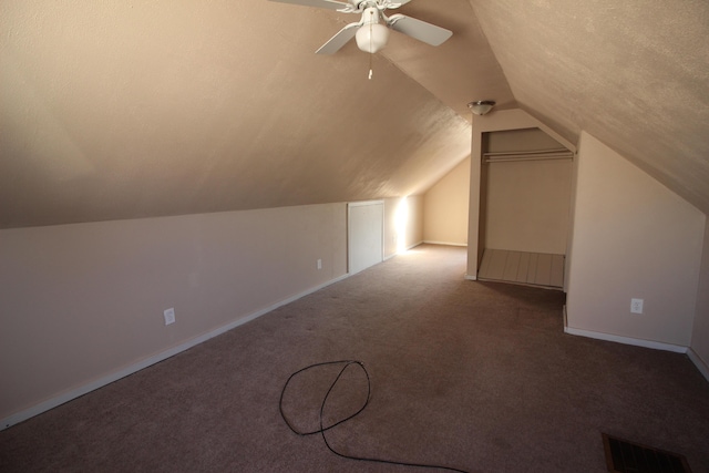 bonus room with visible vents, carpet floors, a ceiling fan, baseboards, and vaulted ceiling