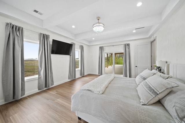 bedroom featuring visible vents, recessed lighting, light wood-style floors, and access to outside
