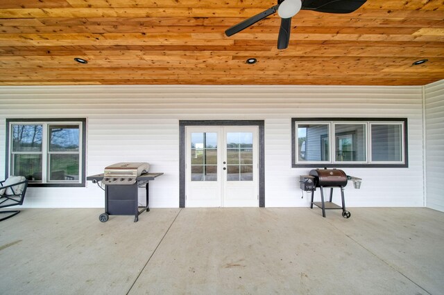 view of patio with area for grilling, ceiling fan, and french doors