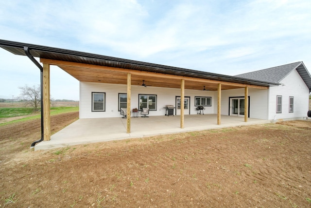 back of house featuring a patio and ceiling fan