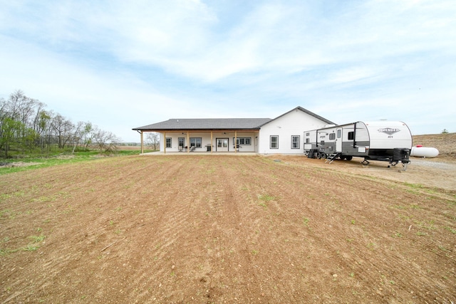 rear view of property with a patio area