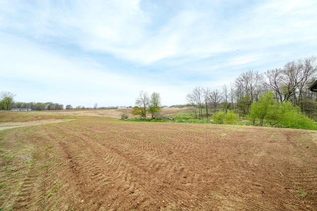 exterior space with a rural view