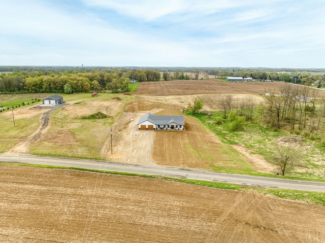 birds eye view of property featuring a rural view