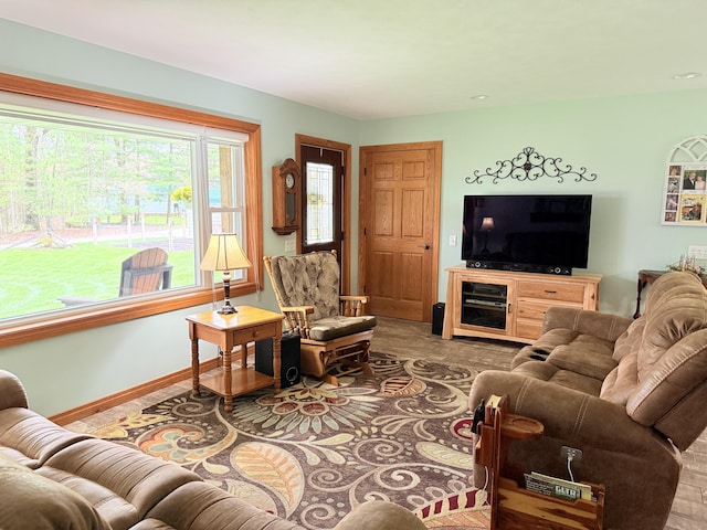 living room featuring baseboards