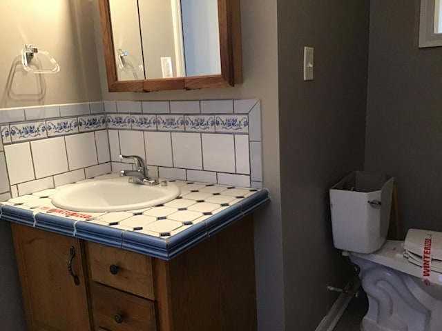 23822 Wellington Ave, Warren, MI 48089 - bathroom with toilet and vanity