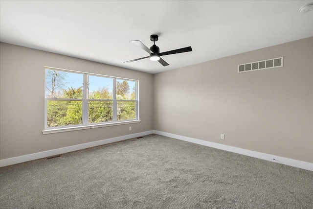 2600 Collegewood St, Ypsilanti, MI 48197 - carpeted spare room featuring a ceiling fan, baseboards, and a smoke detector