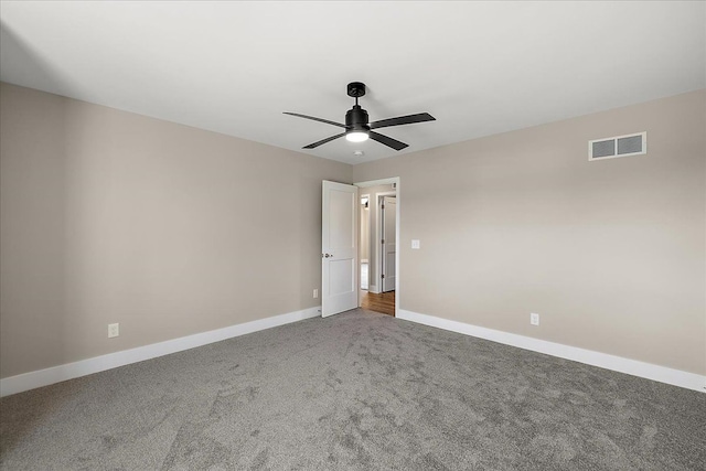 2600 Collegewood St, Ypsilanti, MI 48197 - unfurnished room featuring baseboards, carpet floors, and a ceiling fan