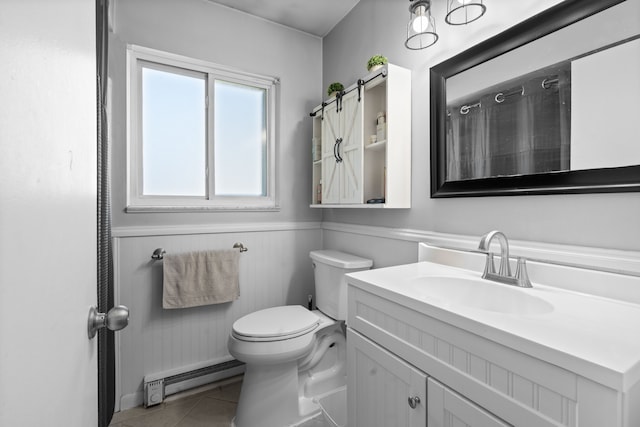 5874 Thornaby Dr, Waterford, MI 48329 - bathroom featuring toilet, vanity, a baseboard radiator, tile patterned flooring, and wainscoting