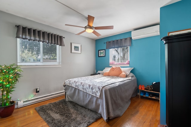 5874 Thornaby Dr, Waterford, MI 48329 - bedroom featuring wood finished floors, an AC wall unit, multiple windows, and a baseboard heating unit