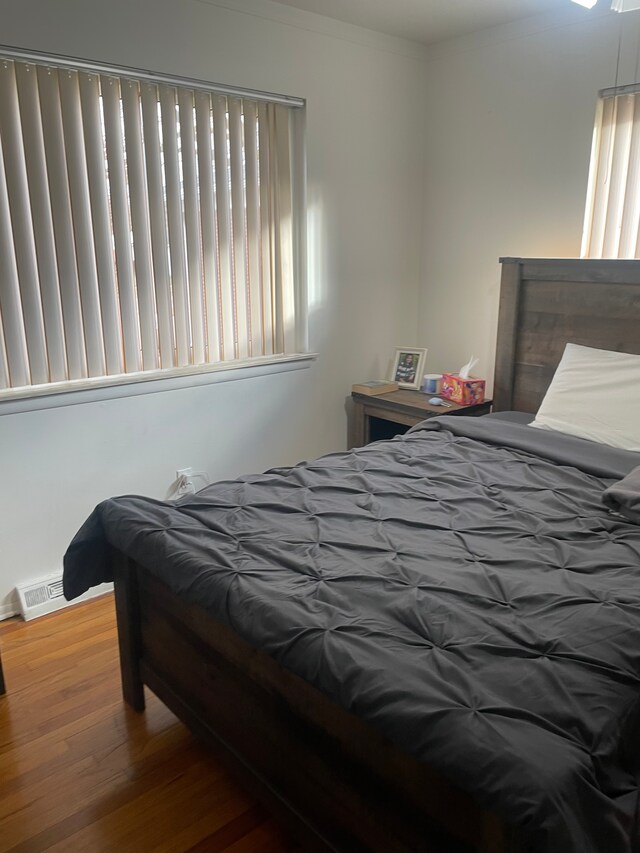 11916 Geoffry Dr, Warren, MI 48093 - bedroom featuring visible vents and wood finished floors