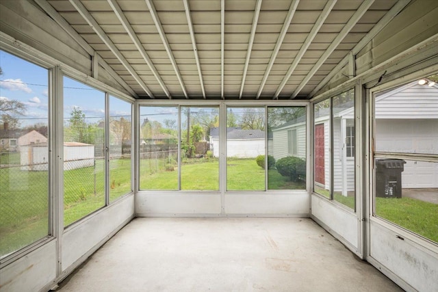 unfurnished sunroom with a wealth of natural light