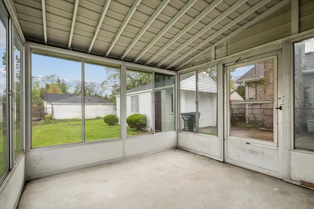 unfurnished sunroom featuring plenty of natural light
